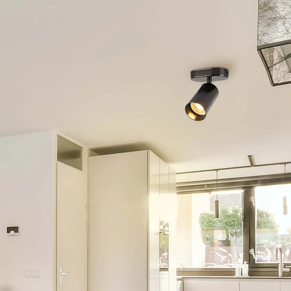 Cilindro Astra Pearl Grey foco GU10 iluminando una sala de estar moderna con decoración minimalista, mejorando la ambientación sin esfuerzo.172-030391