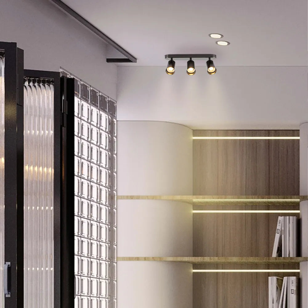 Foco empotrable cilíndrico GU10 Elegant Astra Gris Perla que ilumina una elegante sala de estar moderna con decoración minimalista.172-030393