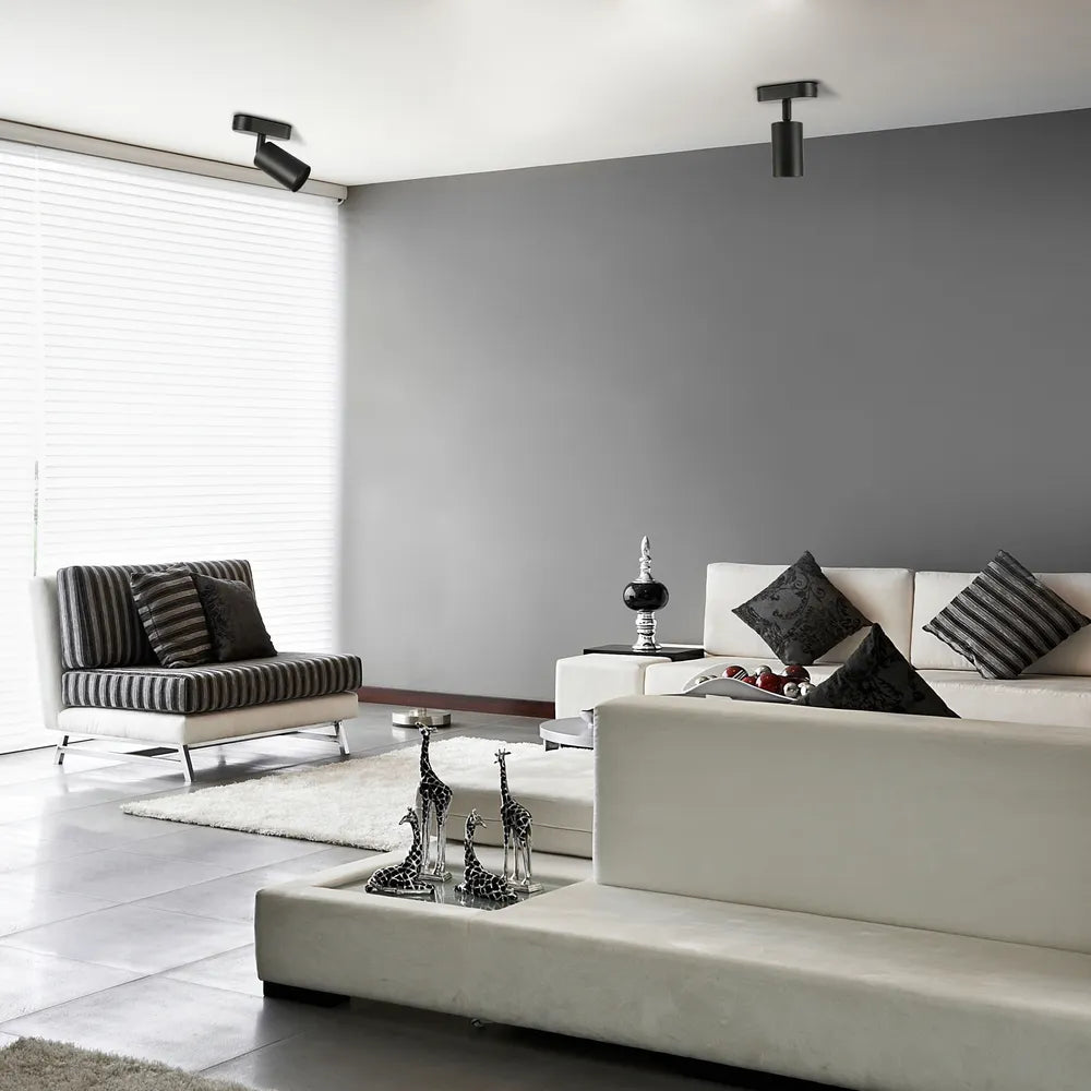 Cilindro de viga moderno con foco GU10 iluminando una sala de estar contemporánea con decoración elegante y muebles de estilo.172-03045