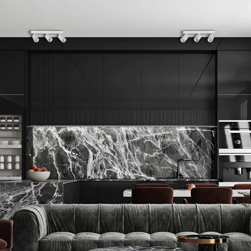 Foco cilíndrico GU10 iluminando una sala de estar moderna con decoración elegante y ambiente cálido. Perfecto para iluminación hogareña con estilo.172-03055