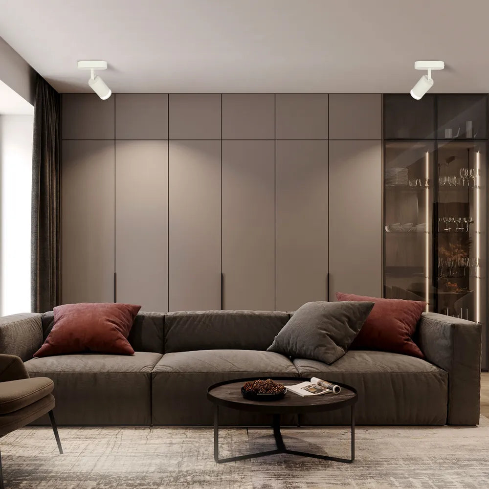 Un elegante aplique circular GU10 ilumina una cocina moderna con decoración contemporánea y una estética minimalista.172-03031