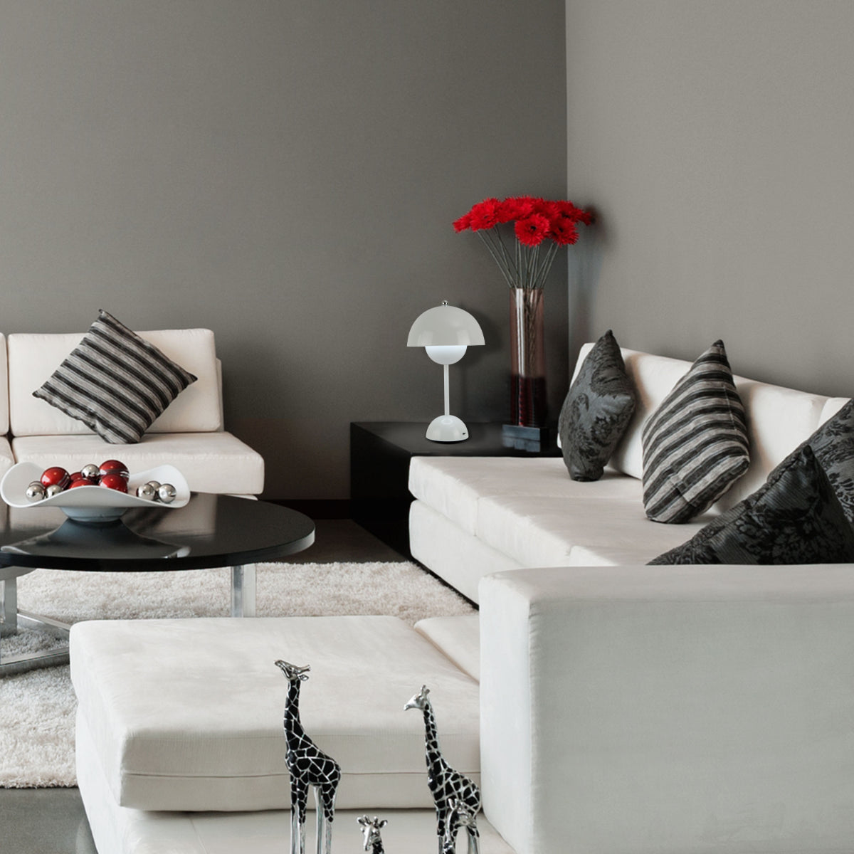 Imagen principal de una lámpara de mesa esférica LED, ideal para salas de estar con un diseño moderno y elegante.