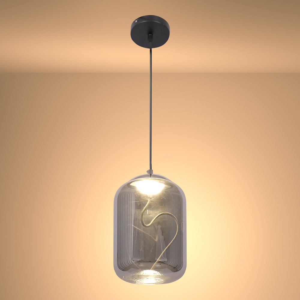 Lámpara colgante de vidrio ahumado, ideal para espacios contemporáneos como comedores, ofreciendo un estilo elegante y moderno.