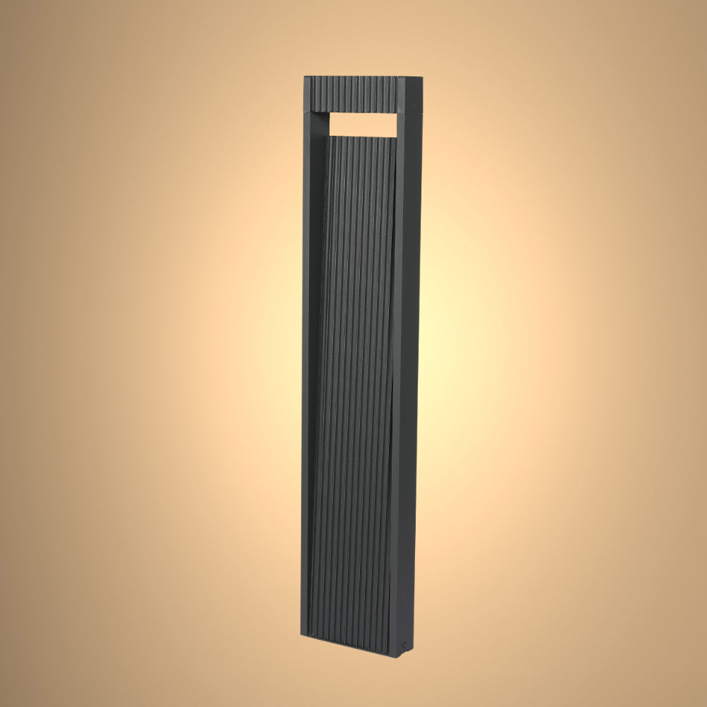 Luz de bolardo LED para exteriores de 13W, ideal para caminos en jardines modernos, proporcionando iluminación eficiente y elegante.