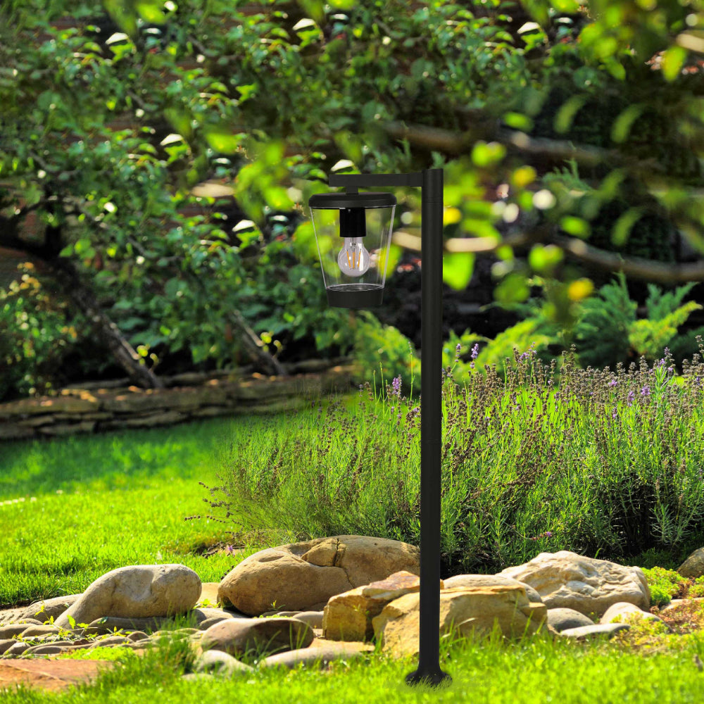 Luz bollard de jardín en gris oscuro, ideal para senderos y exteriores, complementa decoraciones modernas y funcionales.