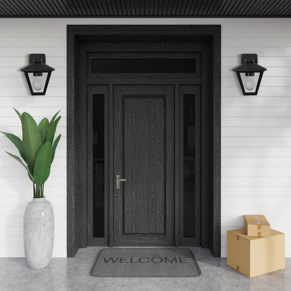 Imagen principal de una lámpara de pared exterior estilo farol, perfecta para patios con decoración rústica y acogedora.