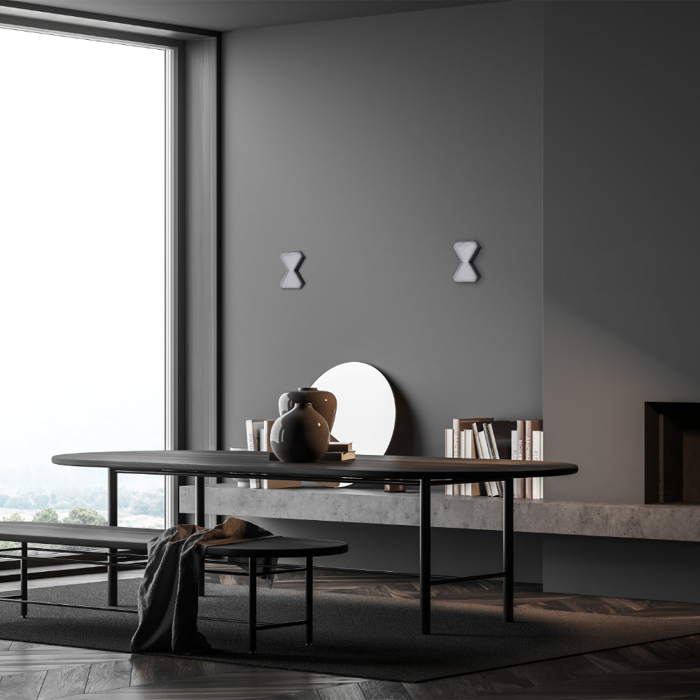 Luz de pared LED moderna en forma de reloj de arena, perfecta para salones con decoración contemporánea y elegante.