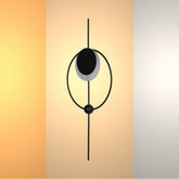 Luz de pared LED moderna en forma de luna geométrica, perfecta para decorar espacios contemporáneos como salas de estar o estudios.