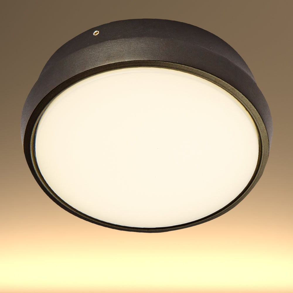 Luz de pared LED moderna en forma de anillo negro, perfecta para exteriores con estilo contemporáneo. Ideal para jardines y patios.