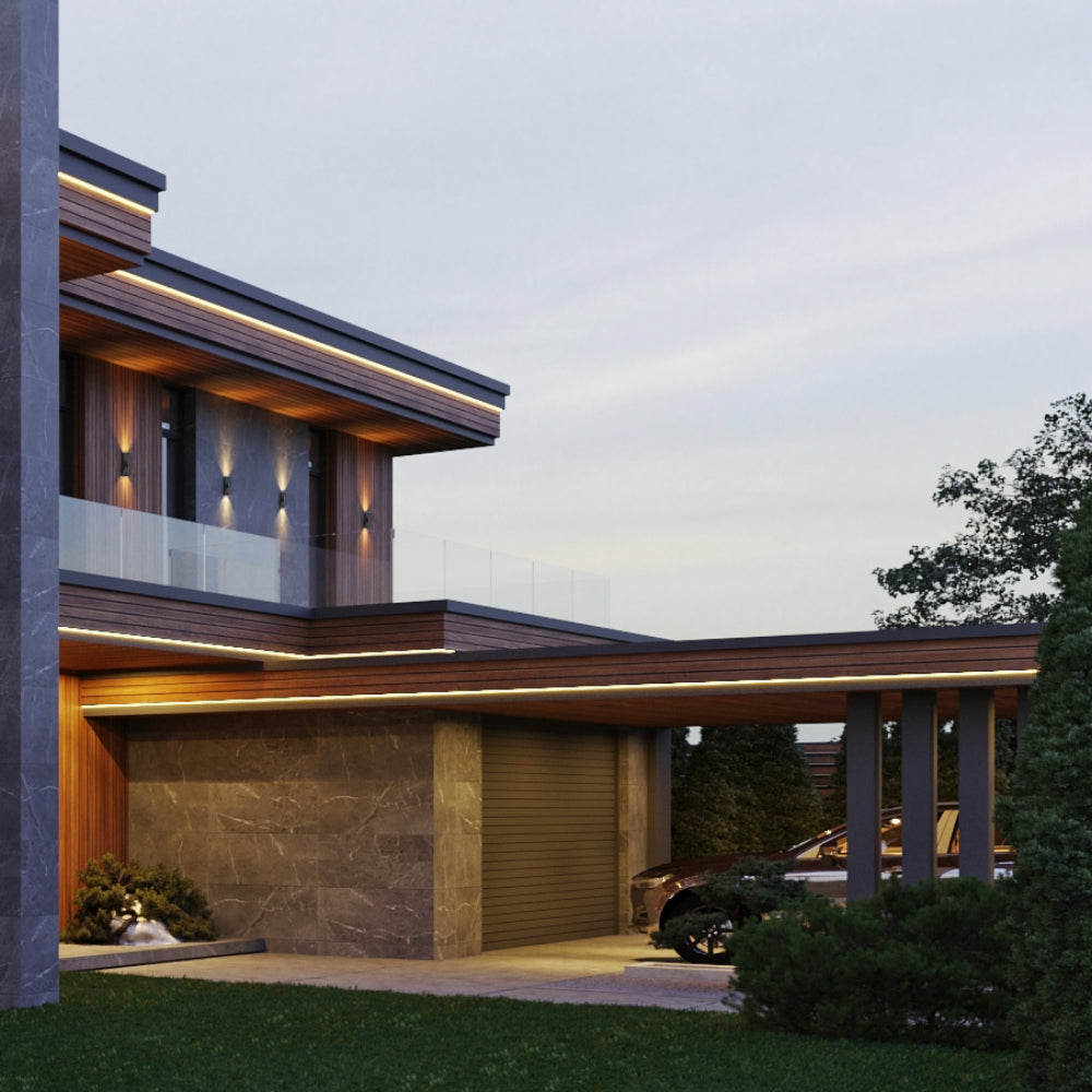Luz de pared LED exterior ajustable, ideal para patios modernos, ofreciendo iluminación en tres temperaturas Kelvin.