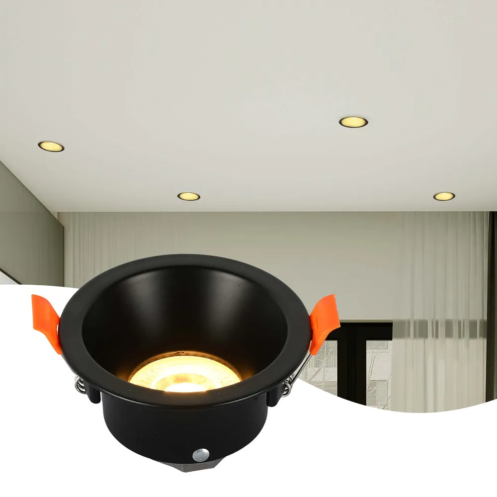 La luminaria empotrada moderna GU10 mejora una cocina elegante con iluminación de bajo deslumbramiento, integrándose perfectamente con la decoración contemporánea.143-03996