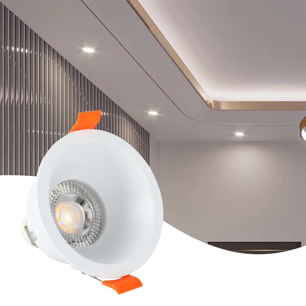 El moderno downlight GU10 ilumina una sala de estar elegante con una decoración refinada, proporcionando una iluminación de baja emisión de deslumbramiento para un ambiente acogedor.143-03997