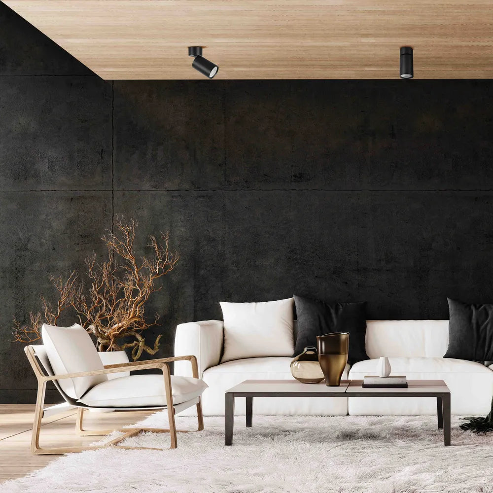 Foco empotrado montado en superficie GU10 moderno y rotativo mejora una sala de estar elegante con decoración contemporánea e iluminación focalizada.172-03025