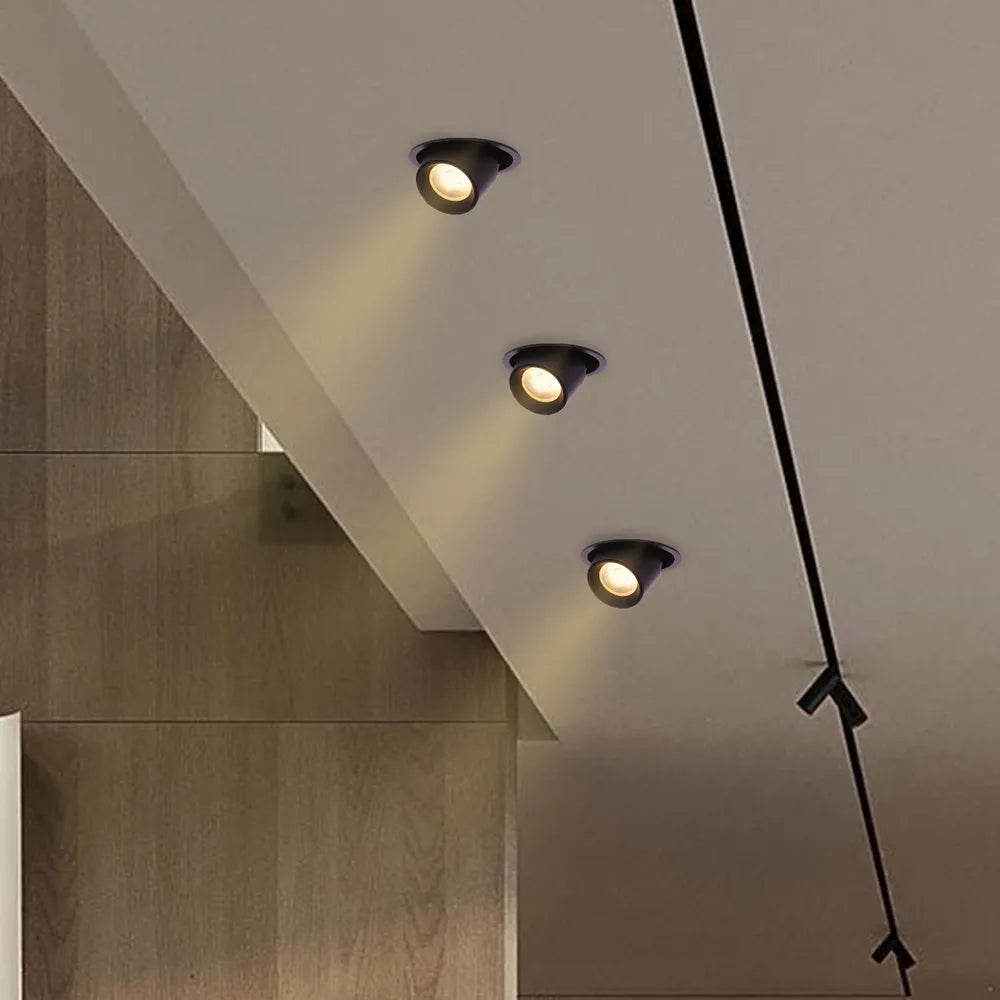 Luz empotrada LED elegante iluminando una sala de estar moderna con decoración minimalista, mejorando el ambiente y la eficiencia energética.143-03408