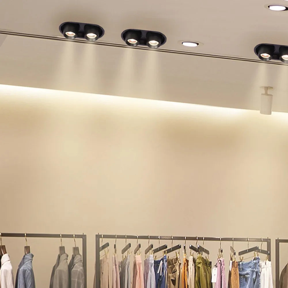Luminaria empotrada LED moderna que destaca una cocina elegante con decoración contemporánea, proporcionando iluminación ajustable y eficiente en términos de energía para un ambiente estiloso.143-03412