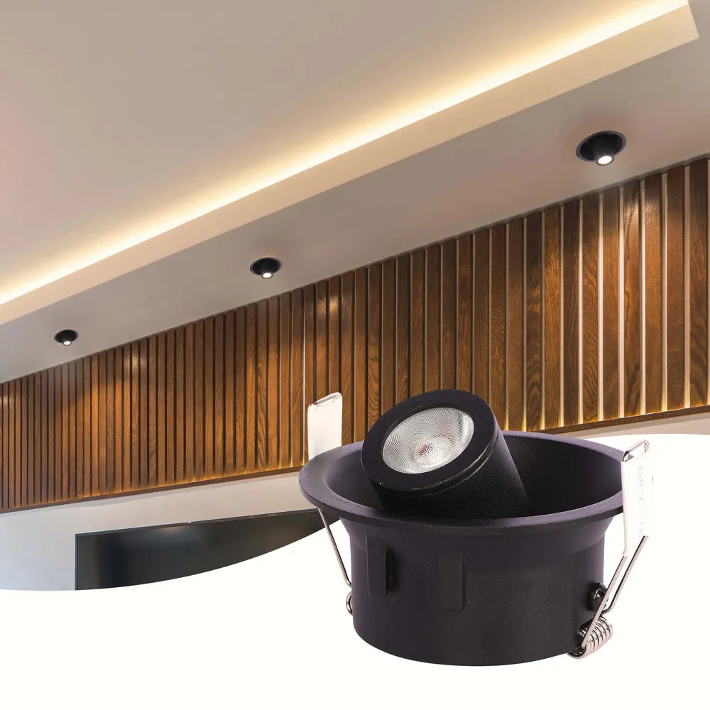 La moderna lámpara empotrada LED ilumina una sala de estar minimalista, mejorando la decoración contemporánea con iluminación elegante y ajustable para una atmósfera acogedora.143-03420