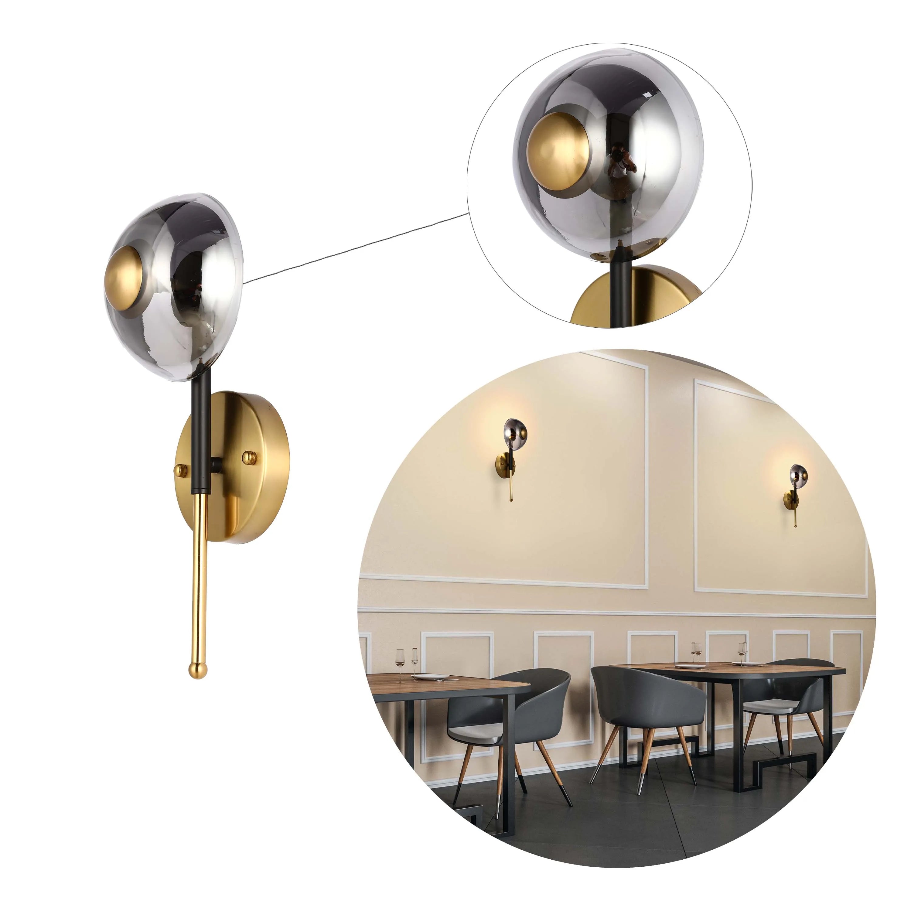 Lámpara de pared con vidrio ahumado y acabado en dorado