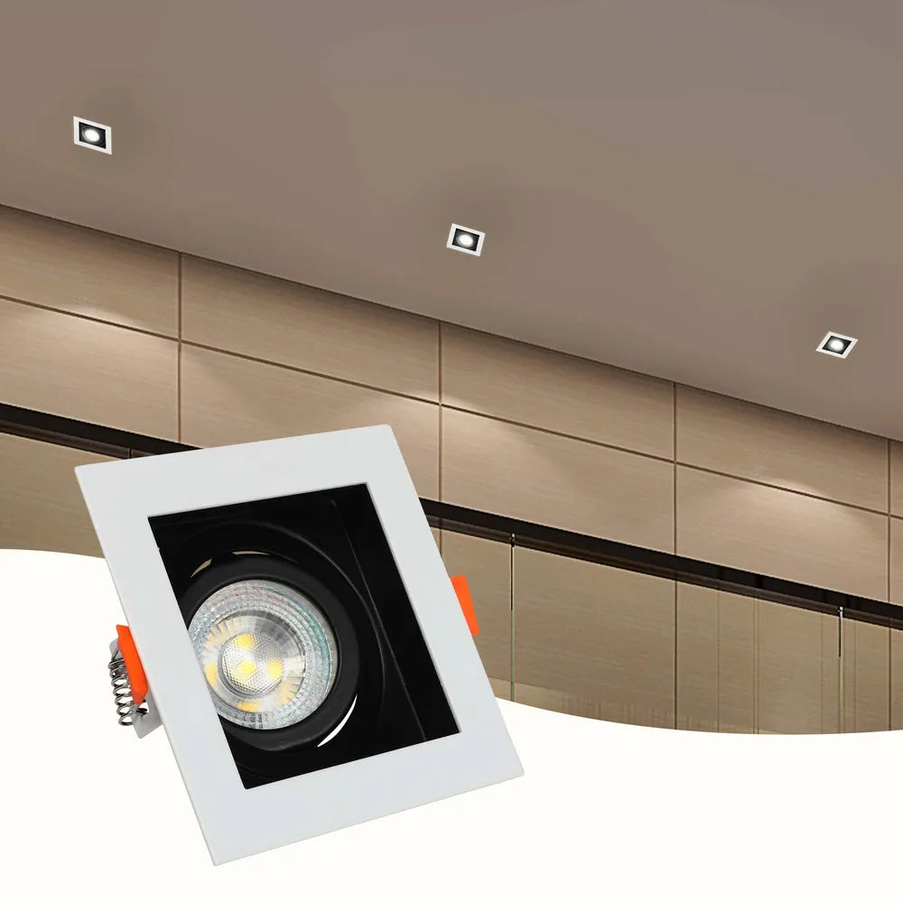 Moderno accesorio de downlight GU10 que ilumina una sala de estar contemporánea con una decoración elegante y un ambiente relajante. Perfecto para realzar interiores.143-03440