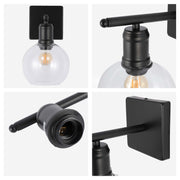 Aplique moderno de pared negro con globo de vidrio transparente, una luz E27