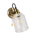 Luz de pared de vidrio ámbar en forma de cono, ideal para salas modernas con un toque elegante y funcional.