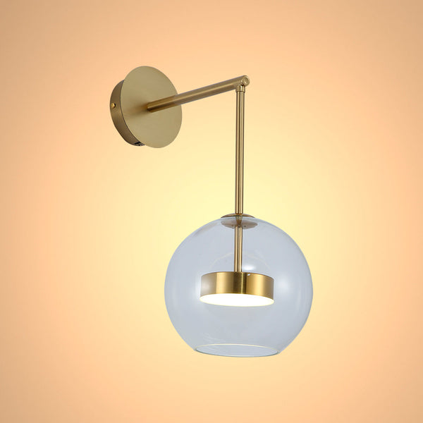 Lámpara de pared en forma de L con vidrio transparente y metal dorado, perfecta para oficinas con estilo moderno y decoración minimalista.
