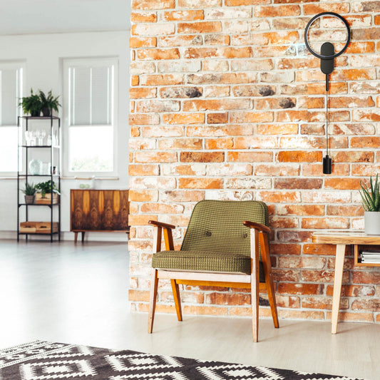 Aplique de pared moderno con doble luz, perfecto para salas de estar o pasillos en decoración contemporánea.