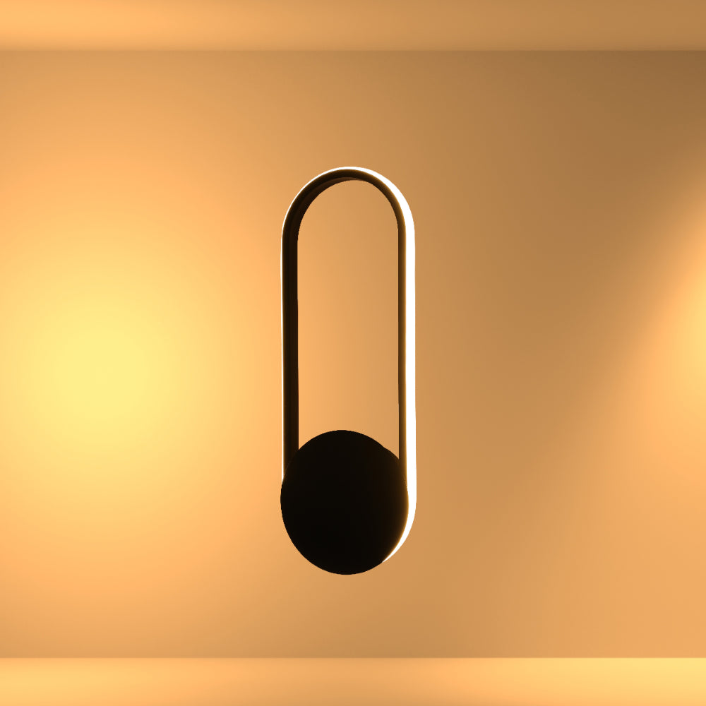 Aplique de pared LED negro de forma elíptica, ideal para salas modernas y espacios con un estilo contemporáneo.