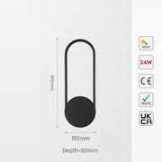 Aplique de pared LED negro en forma de elipse, perfecto para interiores modernos, ideal en salas de estar o pasillos.
