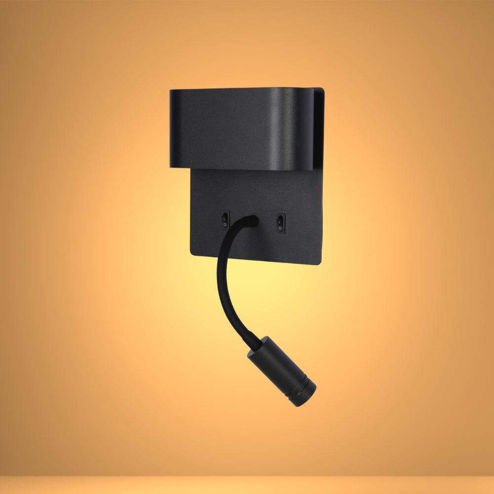 Aplique de pared LED con cuello flexible, ideal para lectura junto a la cama en un dormitorio moderno.