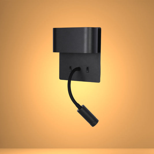 Aplique de pared LED con cuello flexible, ideal para lectura junto a la cama en un dormitorio moderno.