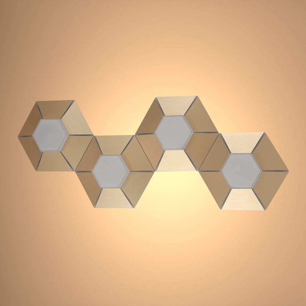 Luz de pared contemporánea tipo panal dorada con luz fría, perfecta para ambientes modernos como livings o oficinas.
