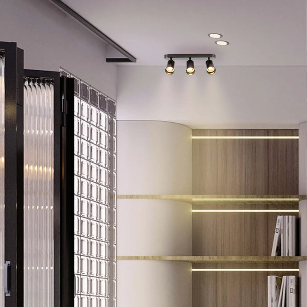 Foco empotrable cilíndrico GU10 Elegant Astra Gris Perla que ilumina una elegante sala de estar moderna con decoración minimalista.172-030393