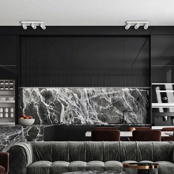 Foco cilíndrico GU10 iluminando una sala de estar moderna con decoración elegante y ambiente cálido. Perfecto para iluminación hogareña con estilo.172-03055