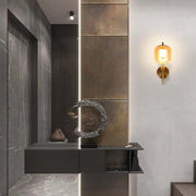 Lámpara de pared de bronce con pantalla de vidrio ámbar o ahumado