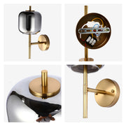 Lámpara de pared de bronce con pantalla de vidrio ámbar o ahumado