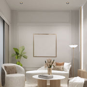 Imagen de un downlight fijo de aluminio fundido con bisel de color, ideal para iluminación moderna en salas de estar o oficinas elegantes.