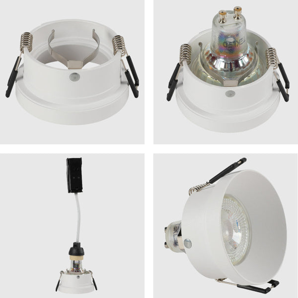 Detalle en primer plano de un downlight empotrado moderno de aluminio, ideal para oficinas con decoración contemporánea.