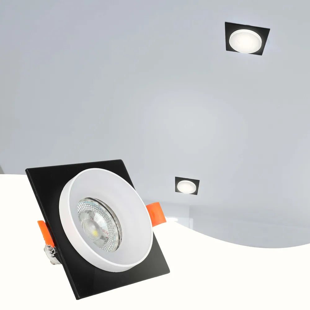 Luminaria empotrable GU10 elegante, iluminando una cocina moderna con gabinetes elegantes y decoración contemporánea, realzando la atmósfera del espacio.143-03432