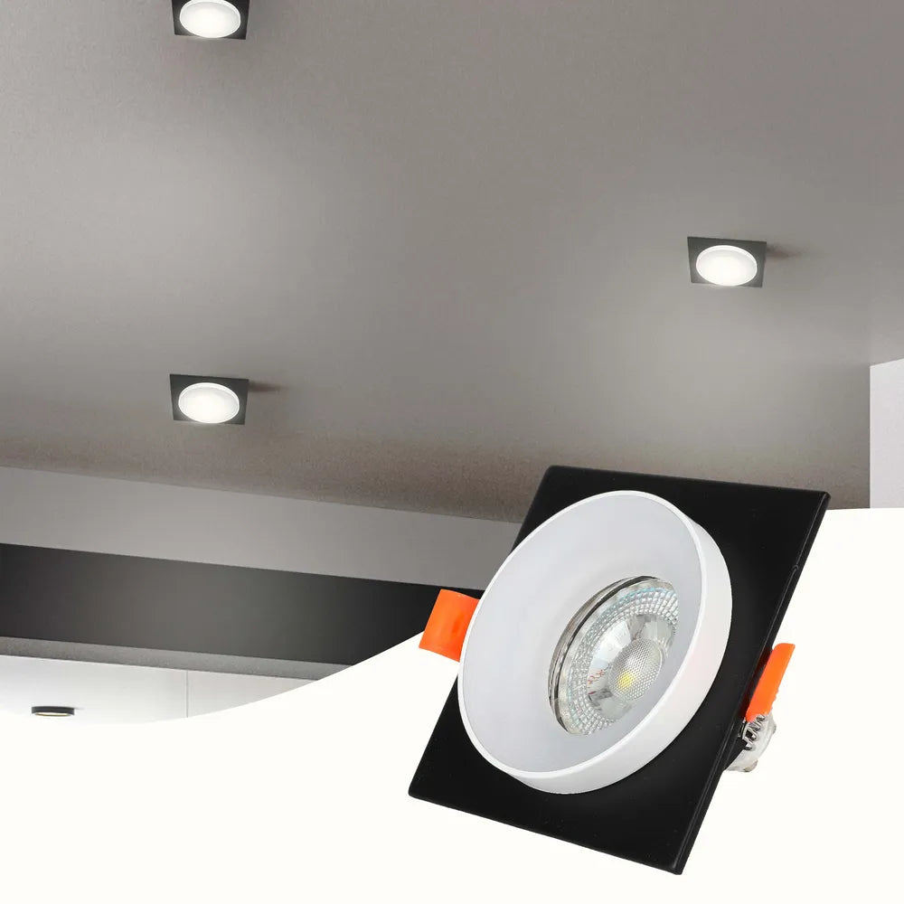 La luminaria empotrable GU10 elegante ilumina una cocina moderna, mejorando su decoración contemporánea con una iluminación cálida y ajustable para un ambiente elegante.143-03432