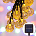 Close up of  Lyra Solar Globe 30 LEDs 65m Warm White String Light
