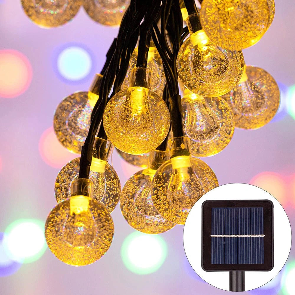 Close up of  Lyra Solar Globe 30 LEDs 65m Warm White String Light