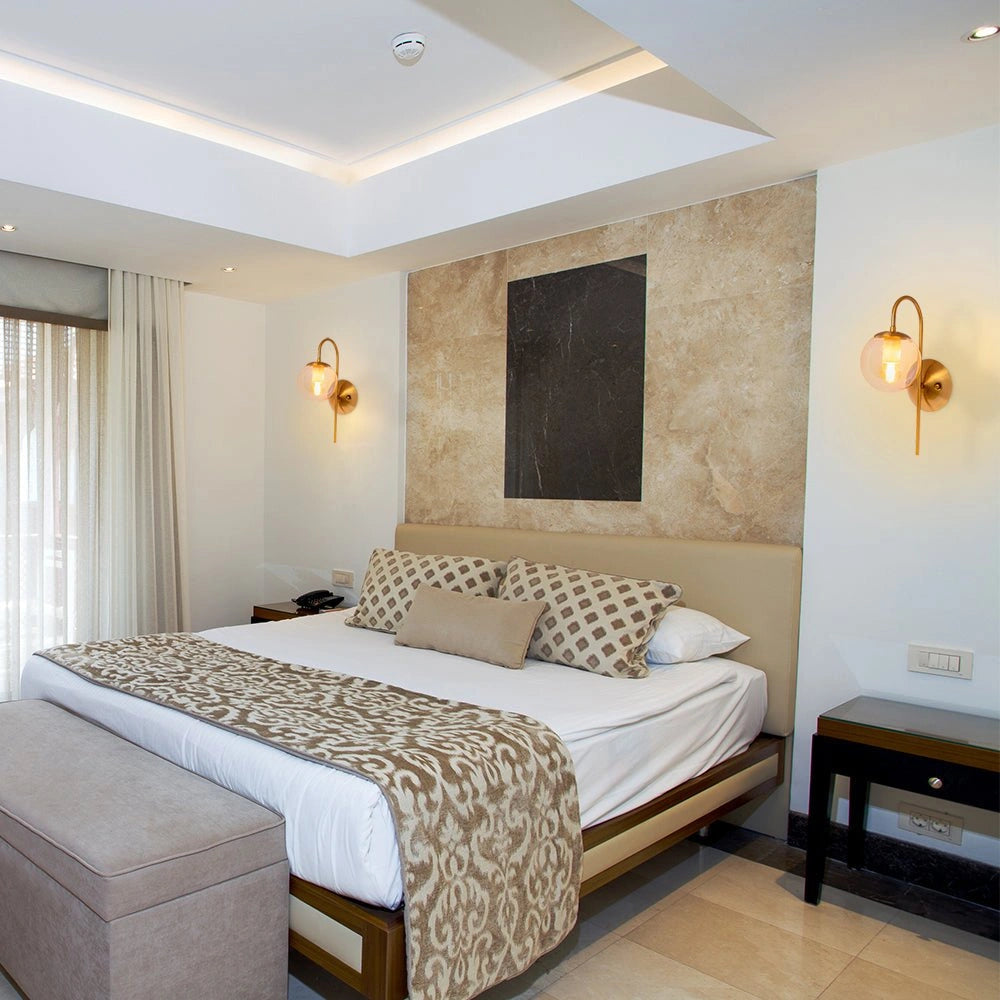 Interior application of Amber Globe Glass Gold Aluminium Bronze Cane Metal Downward Wall Light with E27 Fitting | TEKLED 151-19488