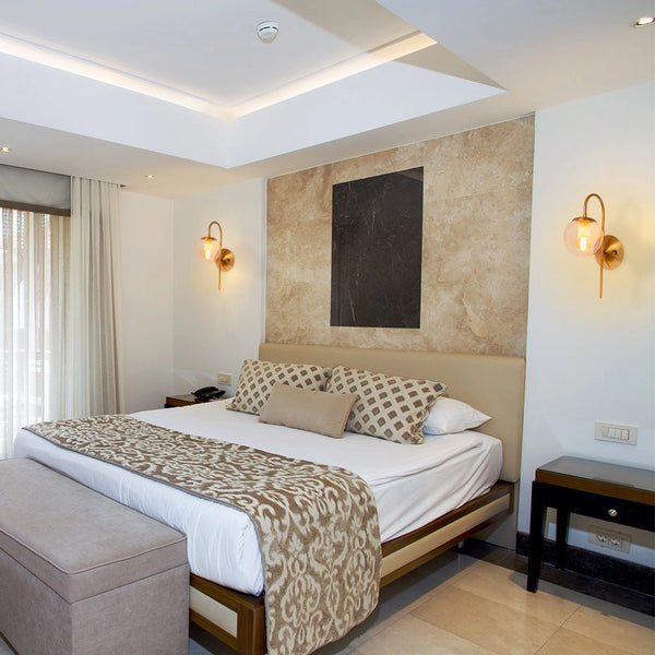 Interior application of Amber Globe Glass Gold Aluminium Bronze Cane Metal Downward Wall Light with E27 Fitting | TEKLED 151-19488