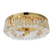Luz de candelabro de cristal redonda, ideal para salones elegantes con decoraciones modernas y toques dorados.