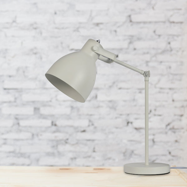 Lámpara de escritorio con brazo ajustable, perfecta para oficinas modernas y ambientes de trabajo estilizados.