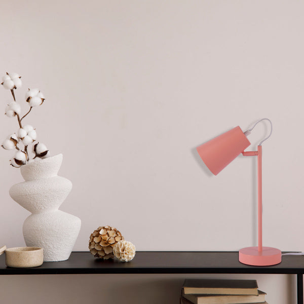 Lámpara de mesa en forma de cono, ideal para oficinas modernas, añade un toque elegante y colorido al ambiente de trabajo.