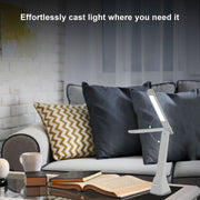 Lámpara de escritorio LED plegable y elegante, ideal para oficinas modernas, ofreciendo control táctil y un diseño minimalista.
