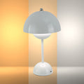 Lámpara de mesa LED esférica con diseño elegante, ideal para oficinas modernas y decoraciones contemporáneas.