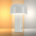 Lámpara de mesa LED recargable con diseño moderno de hongo, perfecta para espacios contemporáneos y accentuando la decoración minimalista.