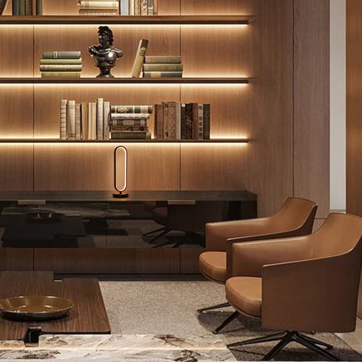 Lámpara de mesa ovalada minimalista con acabado negro, ideal para oficinas con decoración contemporánea y iluminación LED ajustable.